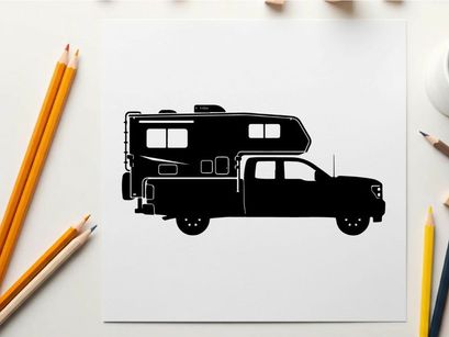 Silhouette of a pickup truck with camper