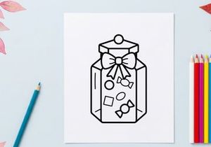 Halloween gift jar with spooky decorations and ribbon. Festive candy container for trick-or-treat celebrations and party favors.