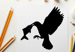 Silhouette of a bird catching a fish in mid air