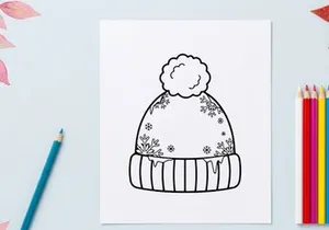 Topi beanie musim dingin dengan pola bunga salju dan pom pom, ilustrasi seni garis hitam putih.
