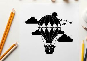 Hot air balloon silhouette flying through sunny sky with clouds