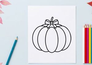 Hand-drawn Halloween pumpkin with decorative bow. Classic autumn gourd illustration for seasonal festive designs.