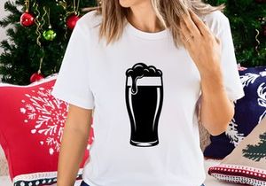 Frothy Dark Beer in a Glass