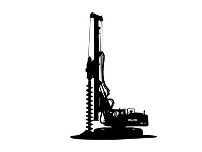 Silhouette of a large drilling machine with a long drill bit