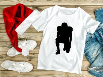 American football player in ready position on white background preview picture