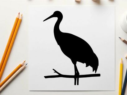 Silhouette of a heron perched on a branch in profile view