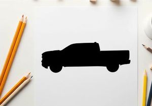 Silhouette of a pickup truck against a white background