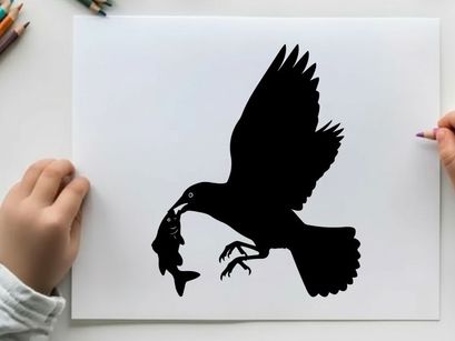 Silhouette of a bird catching a fish in mid air flight