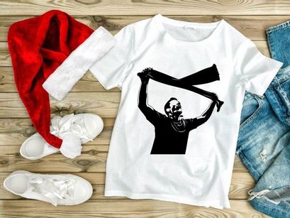 Man holding and waving a scarf in the air with both hands energetically