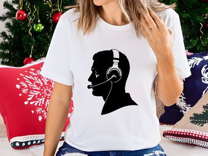 Black silhouette of a man wearing a headset with a microphone