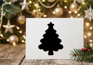 Black Christmas tree silhouette icon with a star topper on a white background