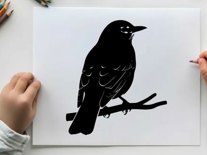 Silhouette of a bird perched on a branch in profile view