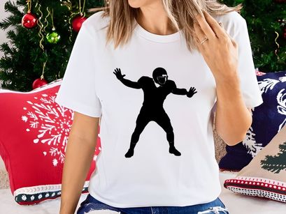 American football player in defensive stance silhouette