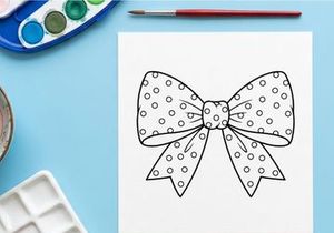 Polka dot gift bow illustration for Christmas holiday present decoration