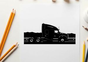 Silhouette of a large truck driving on the highway at sunset silhouette