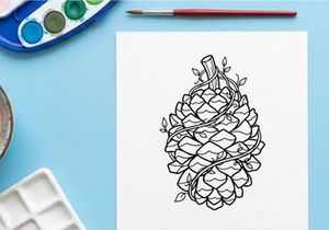 Decorative pine cone with ribbon and floral accents. Elegant holiday ornament for festive decor.