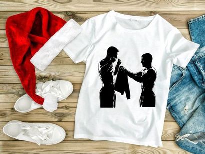 Two silhouetted men engaged in a towel exchange