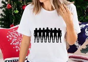 Silhouette of seven humanoid figures standing in a row with arms linked