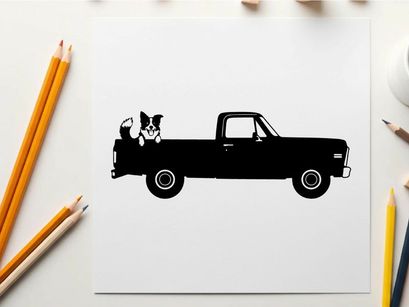 Silhouette of a dog in a pickup truck