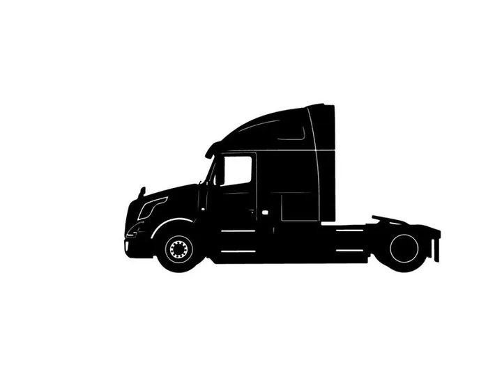 Silhouette of a semi truck with sleeper cabin
