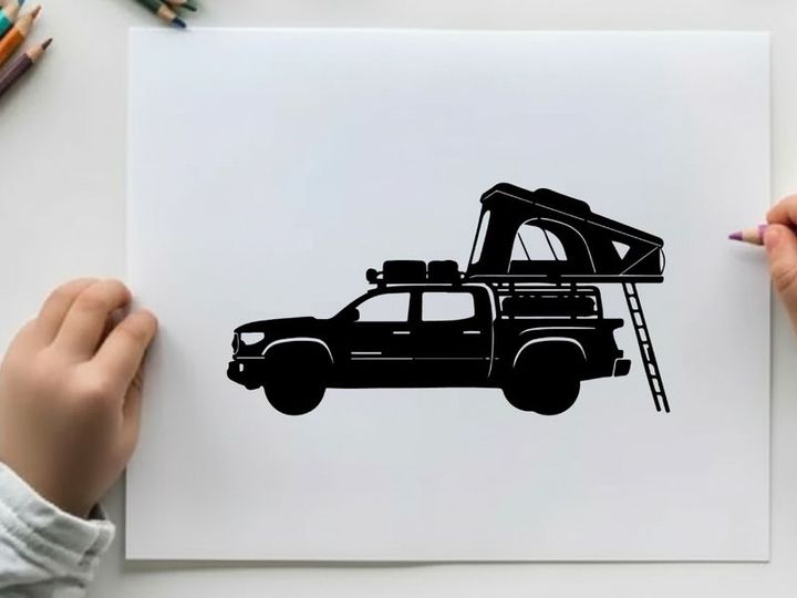 Silhouette of a truck with a rooftop tent and ladder