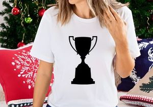 A black silhouette of a classic trophy cup on a white background