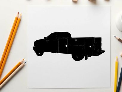 Silhouette of a large black truck with storage compartments