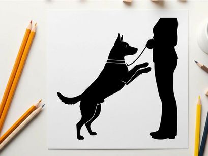 Silhouette of a dog on its hind legs interacting with a person