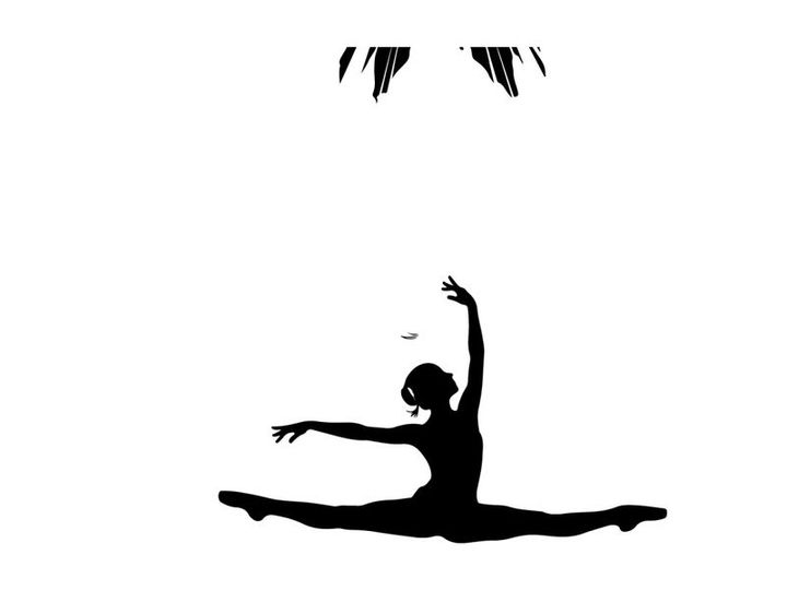 Silhouette of a dancer in a dramatic pose