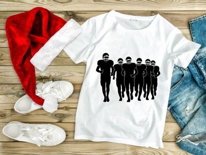 American football players in motion running together in unison