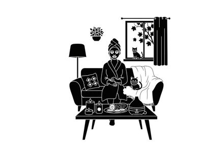 Silhouette of a woman relaxing on a couch with her cat