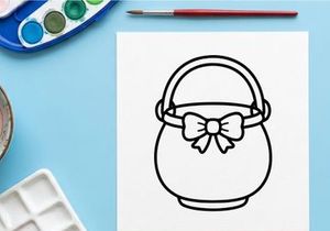 Easter basket line art icon. Simple holiday bucket illustration with a decorative bow.