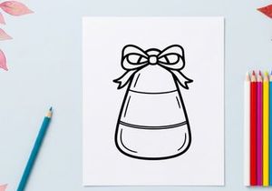 Candy corn with a bow icon. Halloween treat illustration for seasonal holiday design.