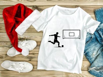 Soccer player kicking ball towards goal in a dynamic motion