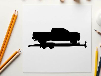 Silhouette of a pickup truck on a trailer