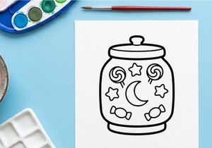 Hand-drawn Halloween cookie jar with moon and stars. Whimsical ceramic container for spooky season treats and baking supplies.
