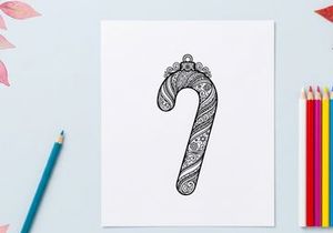 Hiasan permen tongkat Natal dengan pola seni garis zentangle bunga rumit