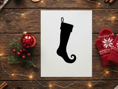 Black silhouette of a Christmas elf stocking isolated on a white background.