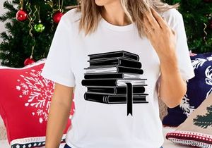 Stack of black books with quill pen education knowledge concept