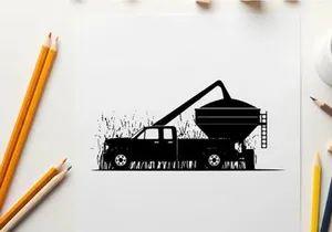 Silhouette of a truck with a grain auger in a field