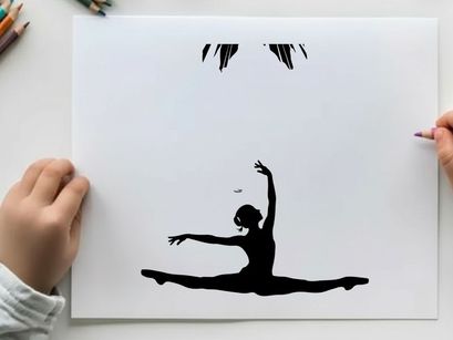 Silhouette of a dancer in a dramatic pose