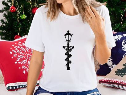 Vintage black street lamp with floral ironwork design silhouette