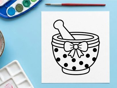 Mortar and pestle with polka dot pattern for herbal remedies. Traditional apothecary tool for grinding spices, medicine, or natural ingredients.