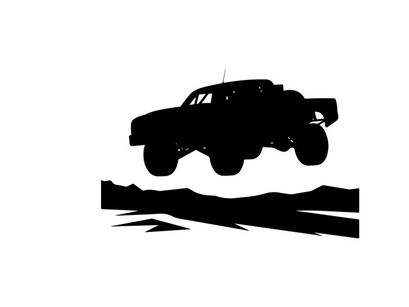 Silhouette of a monster truck in air with large wheels