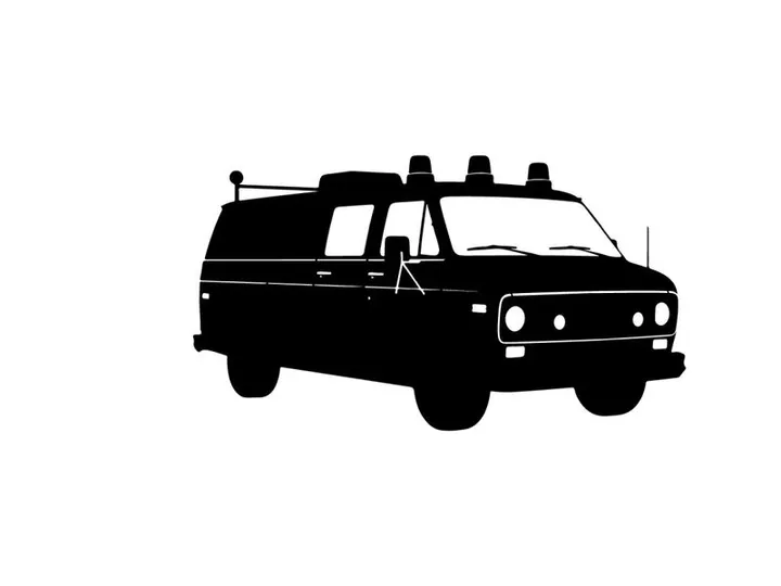 Silhouette of a police car with lights on top