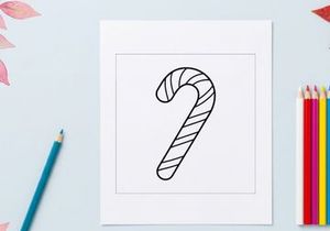 Simple black and white candy cane line art illustration for Christmas holiday design