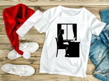 Freelancer working on laptop at home office with natural light preview picture