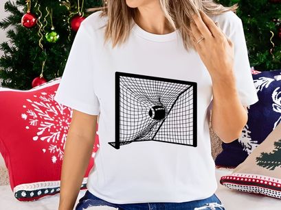 Soccer ball flying into goal net on white background