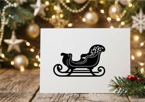 Black silhouette of a decorative Christmas sleigh isolated on a white background