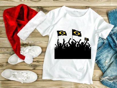 Brazilian flags waving in celebration with a crowd of people